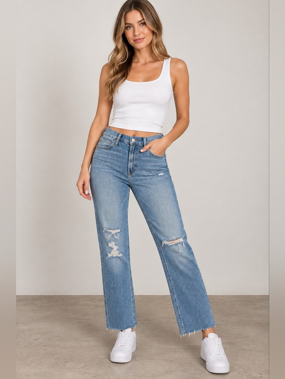 MOTHER Light Blue Jeans with Distressed Knees